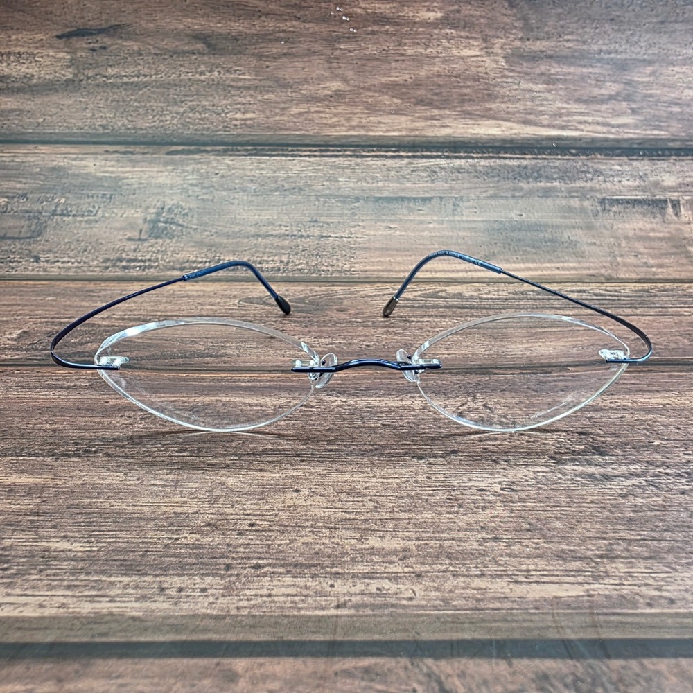 Silhouette M7395 Rimless Cat Eye Eyeglasses Navy Blue Minimalist Frames Austria
